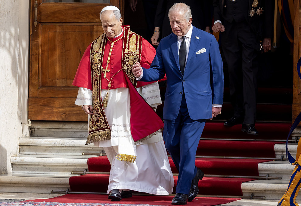 Pope Leo XIV accompanies Britain's King Charles III to the San Damaso Courtyard of the Apostolic Palace at the Vatican at the end of their visit, Oct. 23, 2025. (CNS/Pablo Esparza)