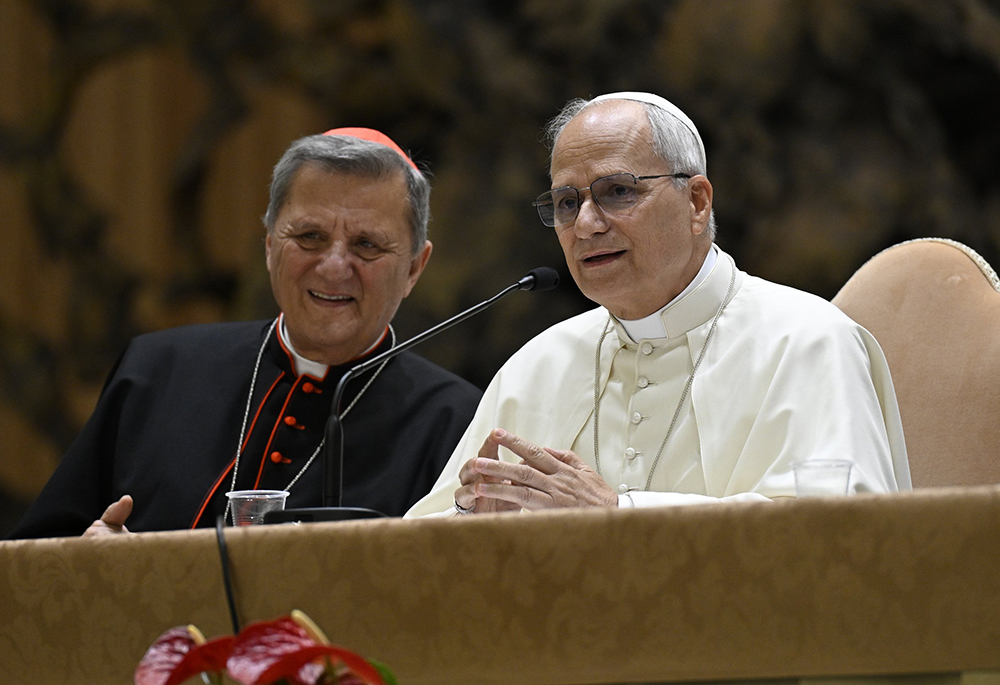 Pope Leo XIV, with Cardinal Mario Grech, secretary-general of the Synod of Bishops, listens to and answers questions from participants in the Jubilee of Synodal Teams and Participatory Bodies in the Vatican audience hall Oct. 24, 2025. (CNS/Vatican Media)