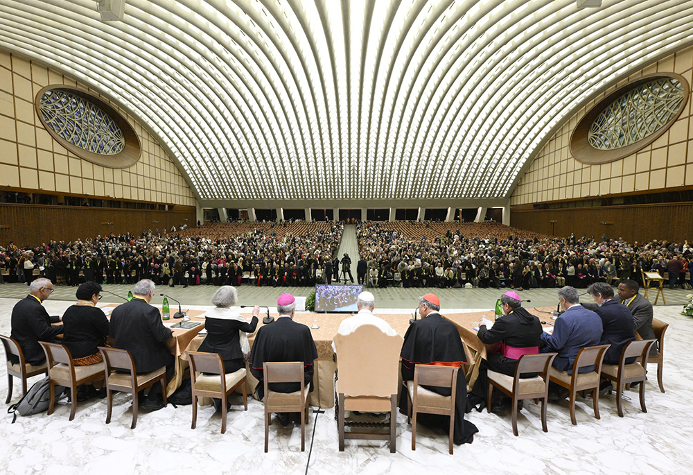 Pope Leo XIV, with regional representatives of synod teams, listens to and answers questions from participants in the Jubilee of Synodal Teams and Participatory Bodies in the Vatican audience hall Oct. 24, 2025. (CNS/Vatican Media)