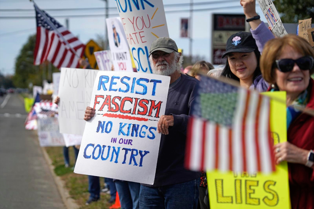 Protesters gather to denounce President Donald Trump's behavior and policies during a "No Kings" rally in Miller Place, N.Y., Oct. 18, 2025. Similar demonstrations took place throughout the day in cities and towns across the nation, drawing millions of participants. (OSV News/Gregory A. Shemitz)