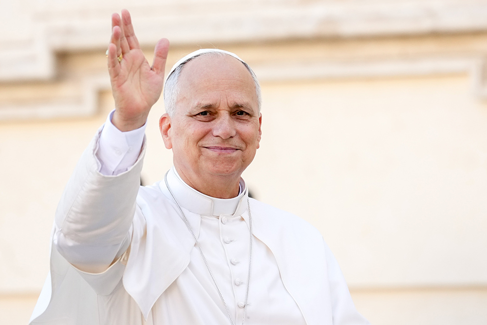 Pope Leo XIV greets people from the popemobile while riding through St. Peter's Square at the Vatican Nov. 1, 2025, after celebrating Mass. (CNS/Lola Gomez)