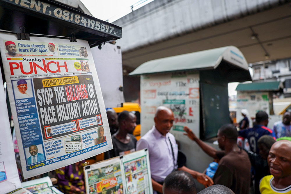 A newspaper with an article reporting U.S. President Donald Trump's message to Nigeria over the treatment of Christians hangs at a newspaper stand in Ojuelegba, Lagos, Nigeria. Nov. 2, 2025. (OSV News/Reuters/Sodiq Adelakun)