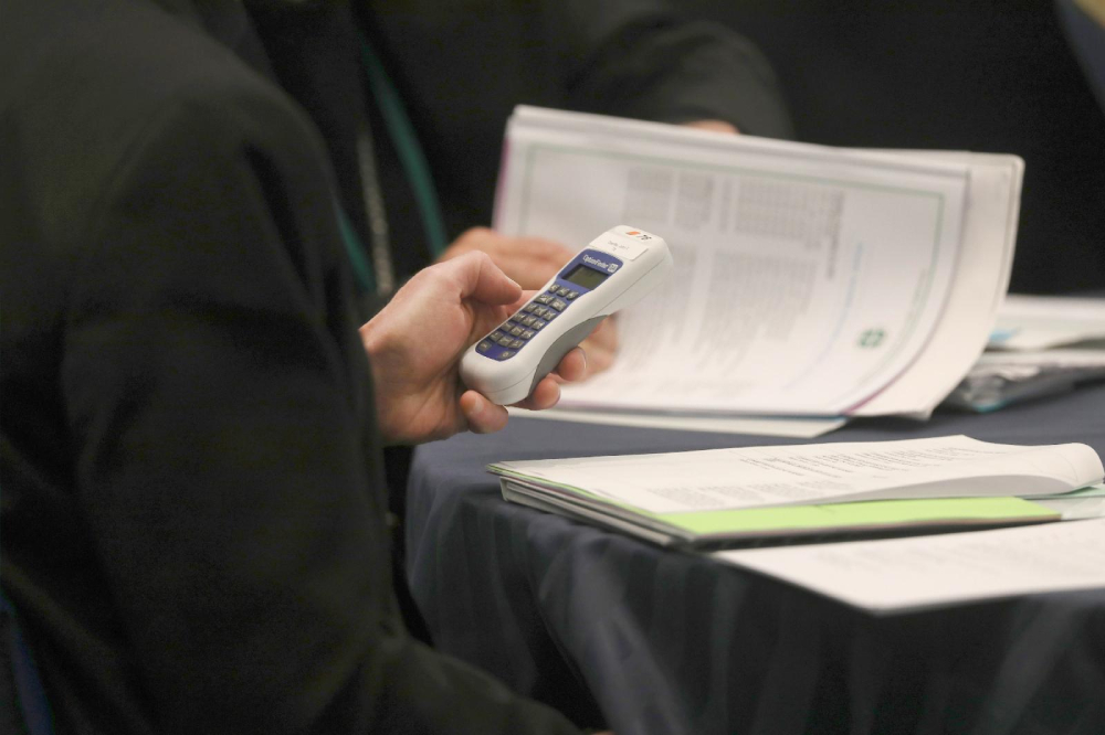 A bishop uses an electronic voting device during a Nov. 14, 2023, session of the fall general assembly of the U.S. Conference of Catholic Bishops in Baltimore. At the U.S. bishops' 2025 fall plenary in Baltimore, the bishops will vote to elect a new conference president. (OSV News/Bob Roller)