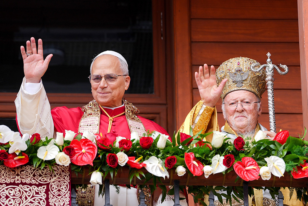 Pope Leo XIV and Orthodox Ecumenical Patriarch Bartholomew of Constantinople greet people from a balcony following a Divine Liturgy celebrated in the Patriarchal Cathedral of St. George in Istanbul Nov. 30, 2025. (CNS/Lola Gomez)