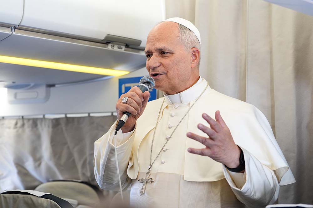 Pope Leo XIV speaks to journalists during a news conference aboard his flight from Turkey to Lebanon, Nov. 30, 2025. (CNS/Lola Gomez)
