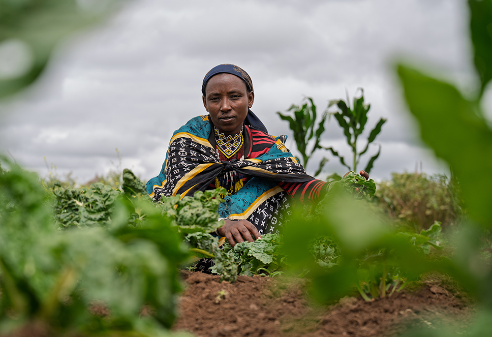"For women and girls, the new water source has completely changed our lives. I used to spend most of the day just collecting water — sometimes until 3 p.m.," said Kabale Kalicha, a woman whose family benefited from a water project in Ethiopia's Borena region led by a collaboration of three Caritas organizations, SCIAF, CAFOD and Trócaire. (SCIAF/James Cave)