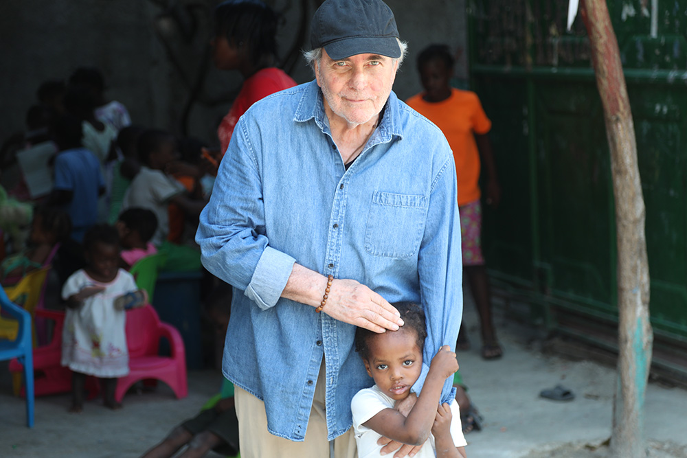Gerry Straub is pictured with Baby Ruth in April 2019 at the Santa Chiara Children's Center in Port-au-Prince, Haiti. Straub founded the home for abandoned and abused kids in May 2015. (Courtesy of Gerry Straub)