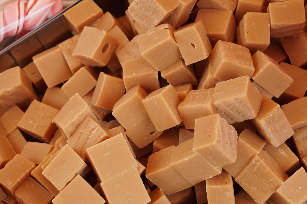 A pile of caramel candies