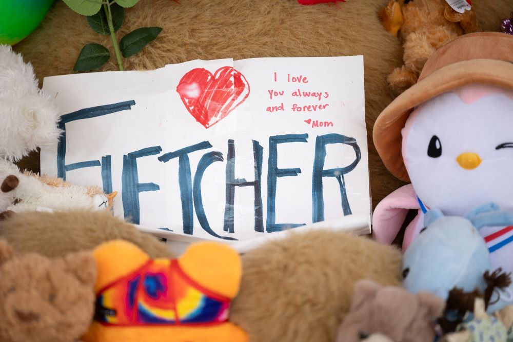 A memorial sign recalls Fletcher Merkel, 8, who died during the shooting at Annunciation Church in Minneapolis Aug. 27.