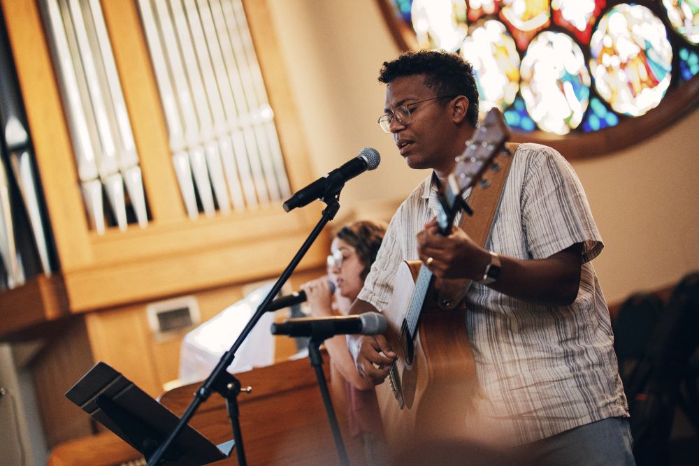 Basilio Perez and his wife Julia Perez, of Oklahoma City, perform music during eucharistic adoration at the Cathedral of Our Lady of Perpetual Help in Oklahoma City on June 1. 
