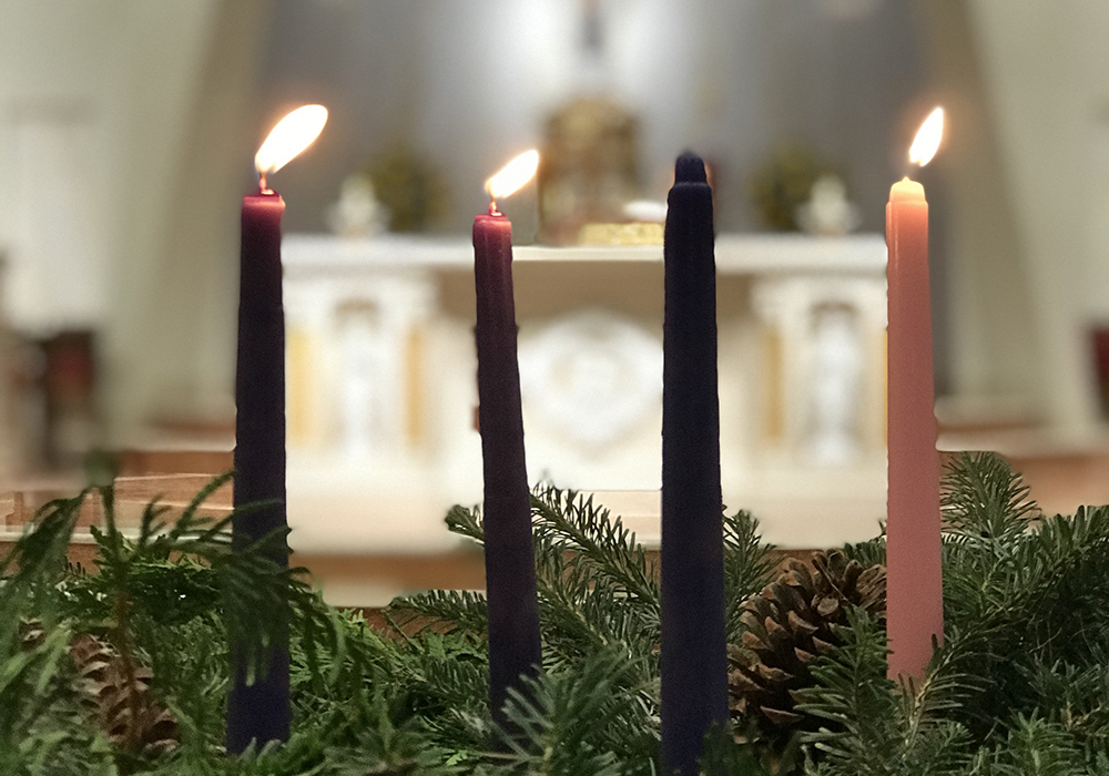 An illustration shows three of the candles lit on the Advent wreath at St. Agnes Church in Arlington, Virginia, Nov. 21, 2023. (OSV News file photo/Arlington Catholic Herald/Ann M. Augherton)