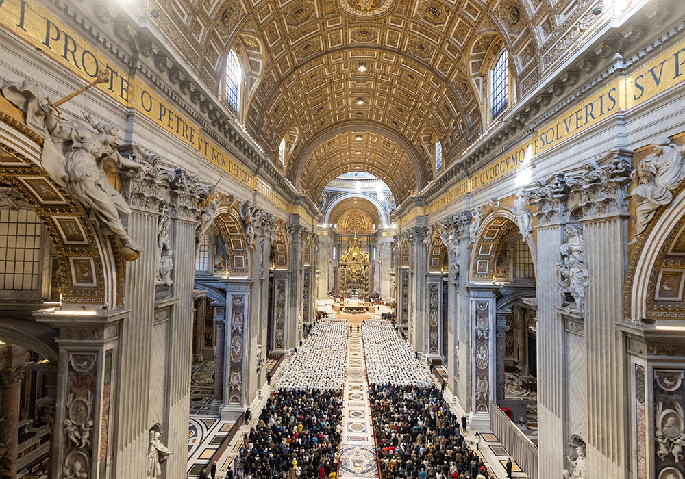 Deacons vested in white with their families and the public behind them attend a diaconate ordination Mass in St. Peter's Basilica celebrated during the Jubilee of Deacons at the Vatican Feb. 23, 2025. (CNS/Pablo Esparza)
