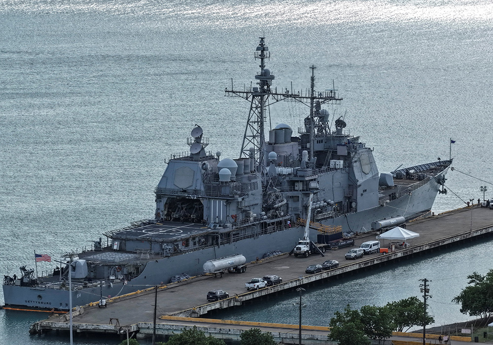 A drone view shows the U.S. Navy guided-missile cruiser USS Gettysburg (CG-64) docked at the port of Ponce, Puerto Rico, Nov. 4, 2025. Amid multiple crises in the Caribbean — including hurricanes, humanitarian crises, unrest and U.S. strikes on Venezuelan vessels — Caribbean bishops have issued calls for calm, unity and peace. (OSV News/Reuters/Ricardo Arduengo)
