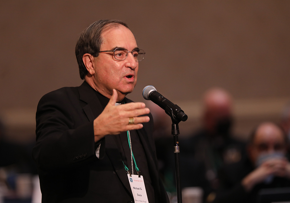 Bishop Michael G. Duca of Baton Rouge, Louisiana, speaks from the floor during a Nov. 17, 2021, session of the fall general assembly of the U.S. Conference of Catholic Bishops in Baltimore. Amid immigration detention sweeps in Louisiana, Duca issued a dispensation Dec. 4, 2025, from the obligation to attend Mass for those Catholics who are "rightfully afraid to participate in Mass because of their fear." (OSV News/Bob Roller)