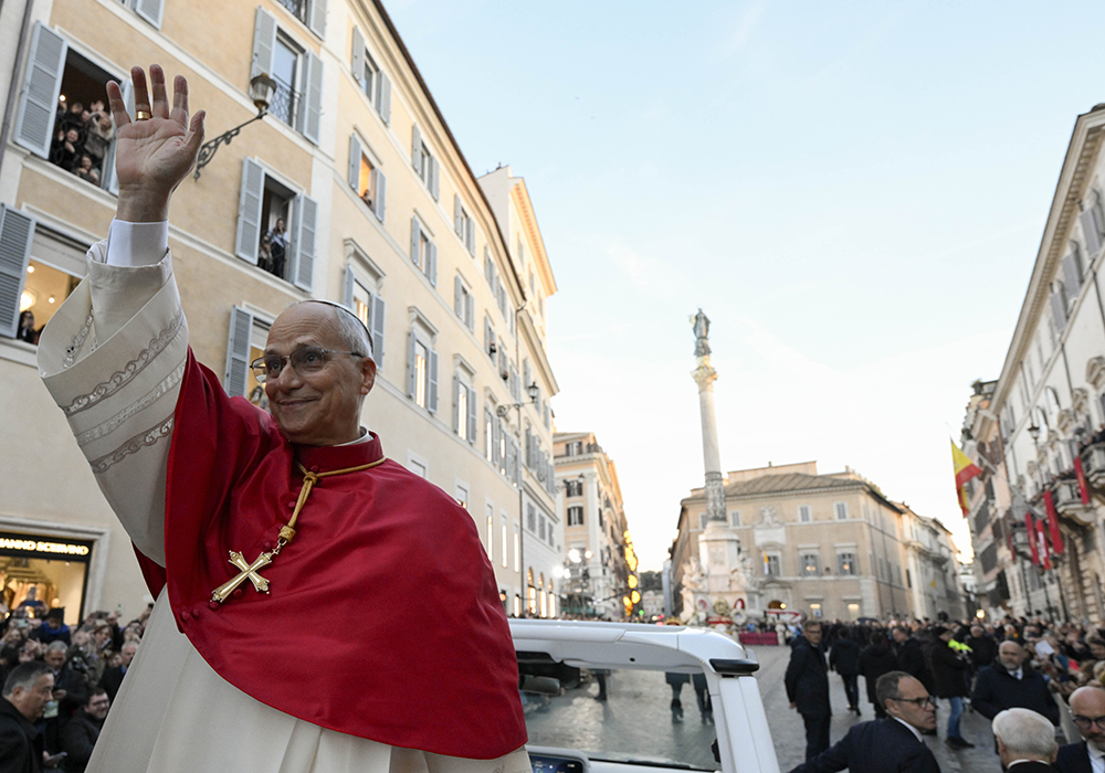 Pope Leo XIV waves from the popemobile as he arrives near the Spanish Steps in the center of Rome to lead prayers to Mary Dec. 8, 2025, the feast of the Immaculate Conception. (CNS/Vatican Media)