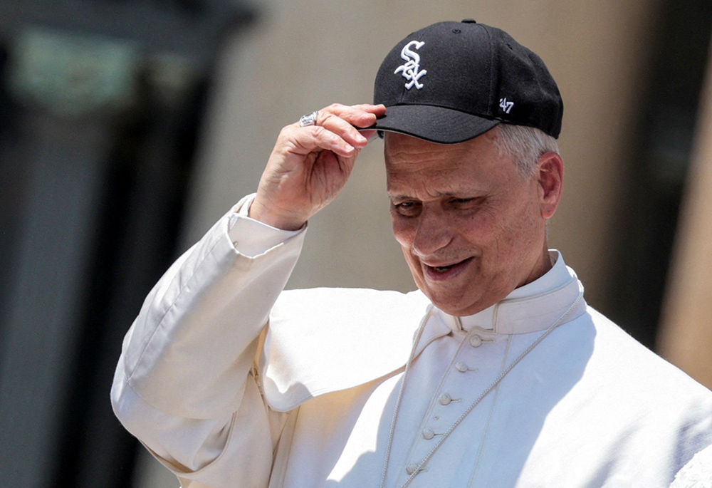 Pope Leo XIV wears a Chicago White Sox baseball cap during his weekly general audience in St. Peter's Square at the Vatican June 11, 2025. (OSV News/Reuters/Remo Casilli)