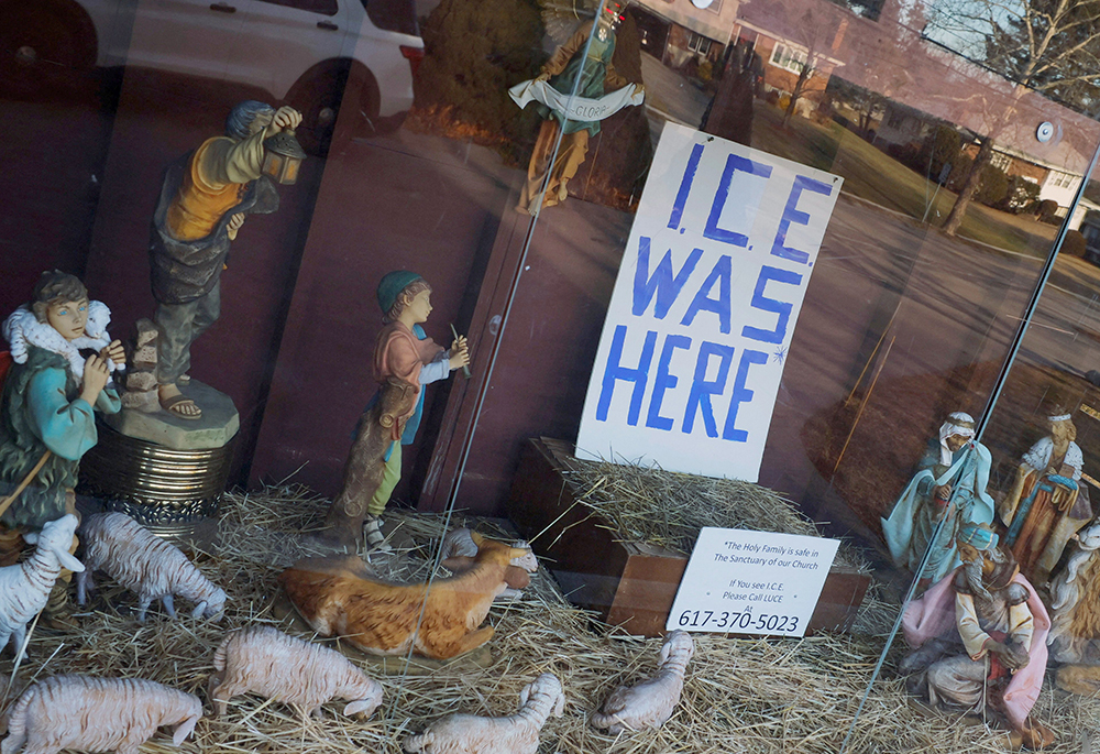 A sign reading "ICE Was Here" stands in the outdoor Nativity at St. Susanna Catholic Church in Dedham, Massachusetts, Dec. 8, 2025. (OSV News/Reuters/Brian Snyder)