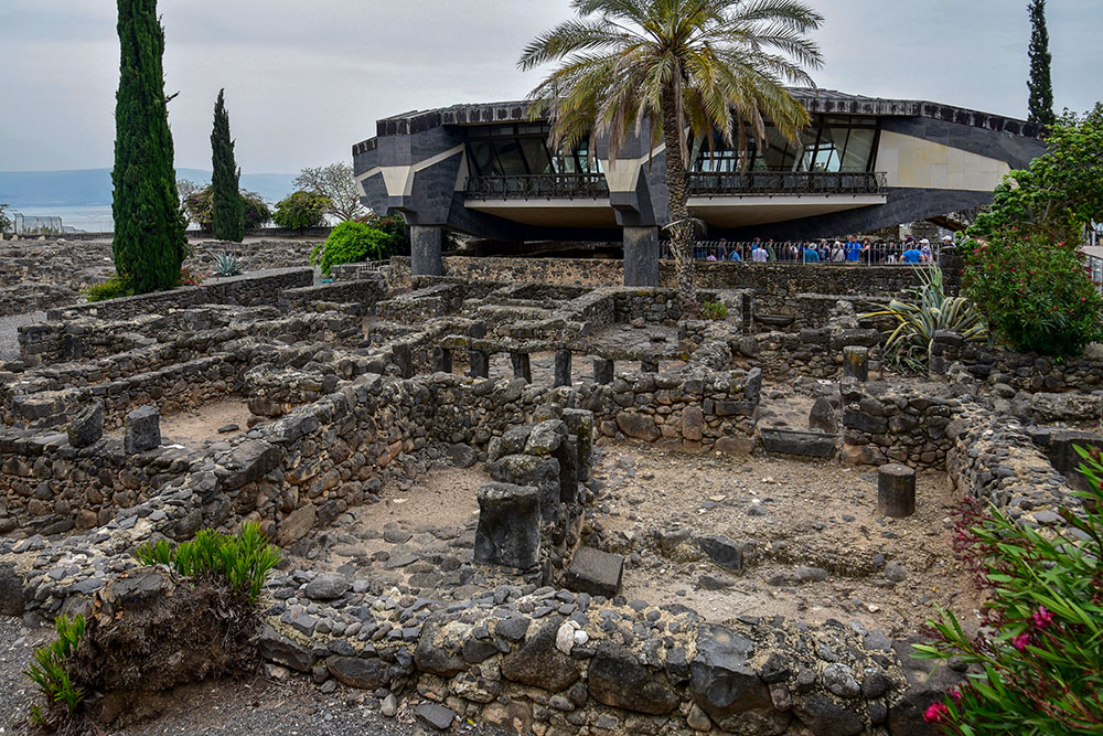 Remains of ancient residential buildings are seen next to St. Peter's Church at the archaeological site of Capernaum in northern Israel. The church is built over the site believed to be the house of St. Peter. (Wikimedia Commons/Bahnfrend)