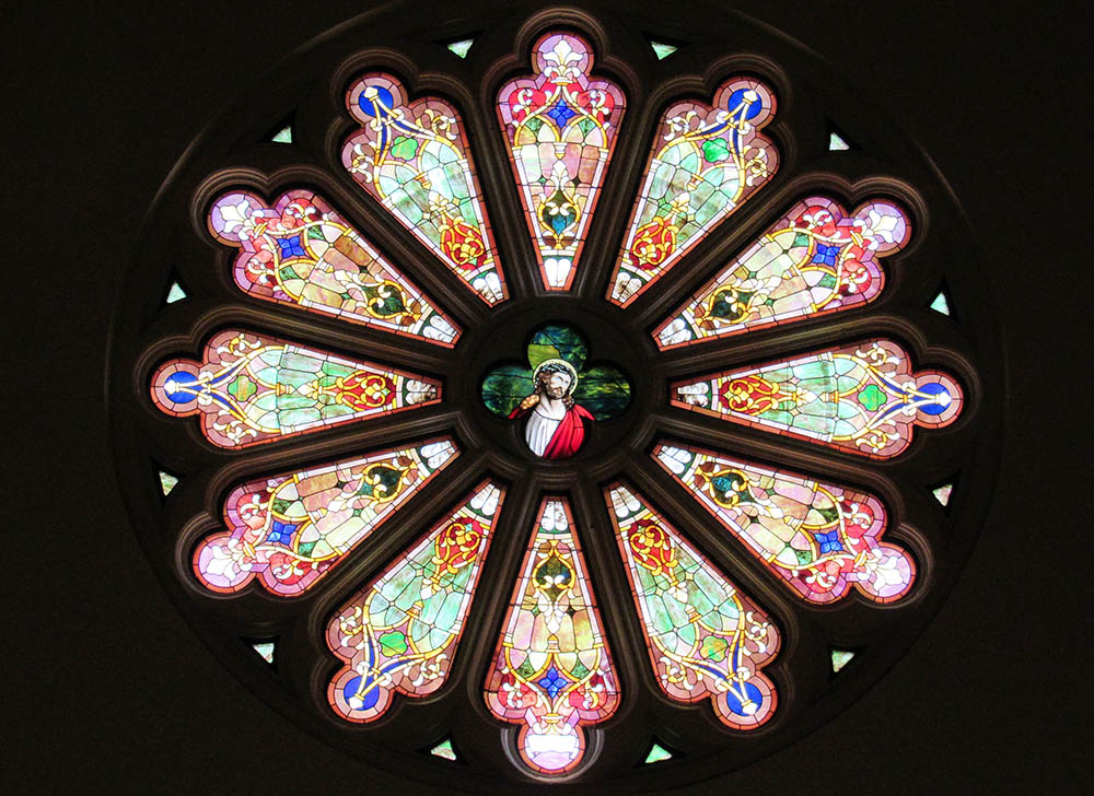 One of the rose windows at the National Shrine Cathedral of Our Lady of Guadalupe, seat of the Dallas Diocese (Wikimedia Commons/Farragutful)