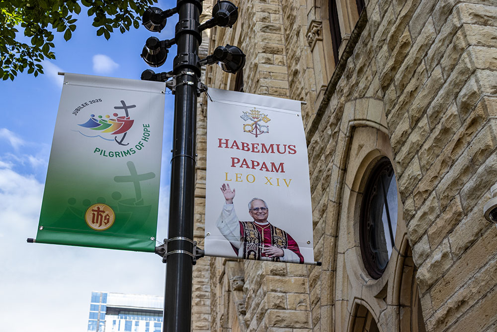 Banners for the Catholic Church's Jubilee Year of Hope and for the election of Pope Leo XIV hang outside Holy Name Cathedral in Chicago Oct. 25, 2025. (NCR photo/Teresa Malcolm)