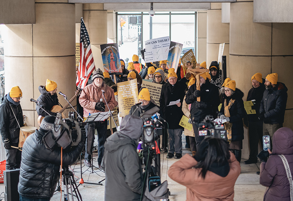 Catholic activists gather outside the U.S. Immigration and Customs Enforcement's Chicago field office to request permission to bring Communion to detainees, Dec. 19. (Courtesy of Coalition for Spiritual and Public Leadership/Bryan Sebastian)