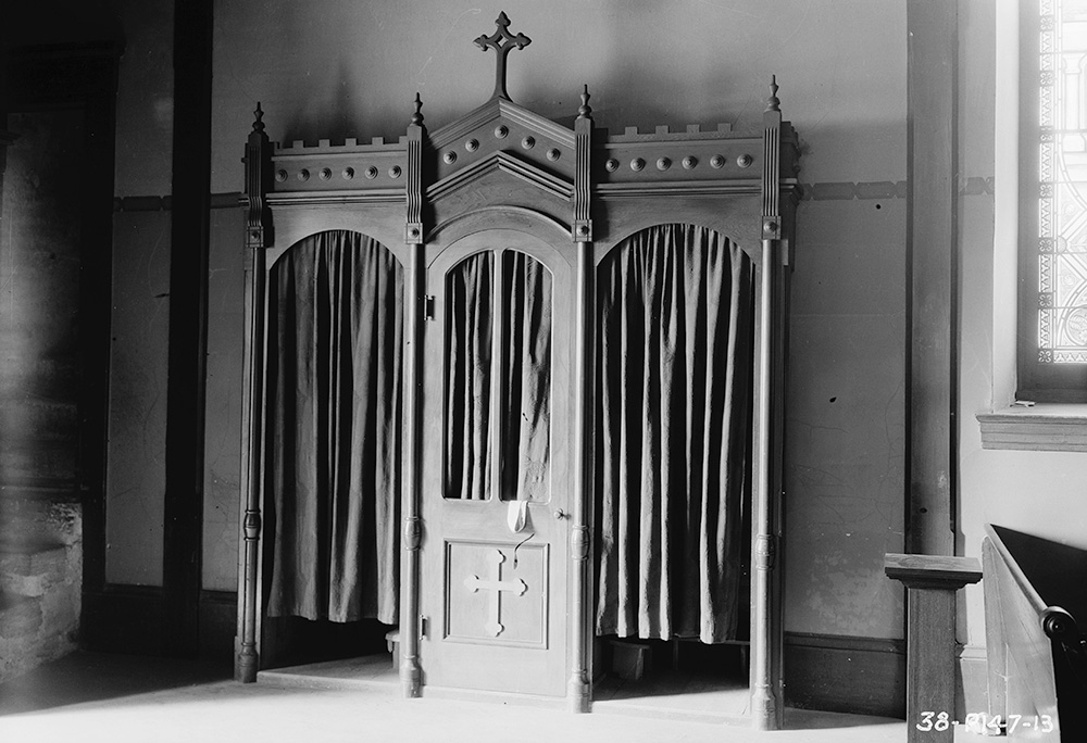A confessional is seen in the Cathedral of San Carlos Borromeo in Monterey, California, in 1934. (Library of Congress Prints and Photographs Division/Roger Sturtevant)