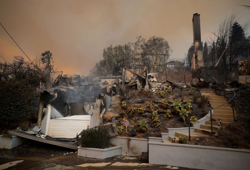 A burned home stands in ruin in the Pacific Palisades neighborhood of west Los Angeles Jan. 8, 2025. Wildfires in the Los Angeles area killed at least 31 people, destroyed more than 16,000 buildings and spread across nearly 80 square miles. (OSV News/Reuters/Mike Blake)