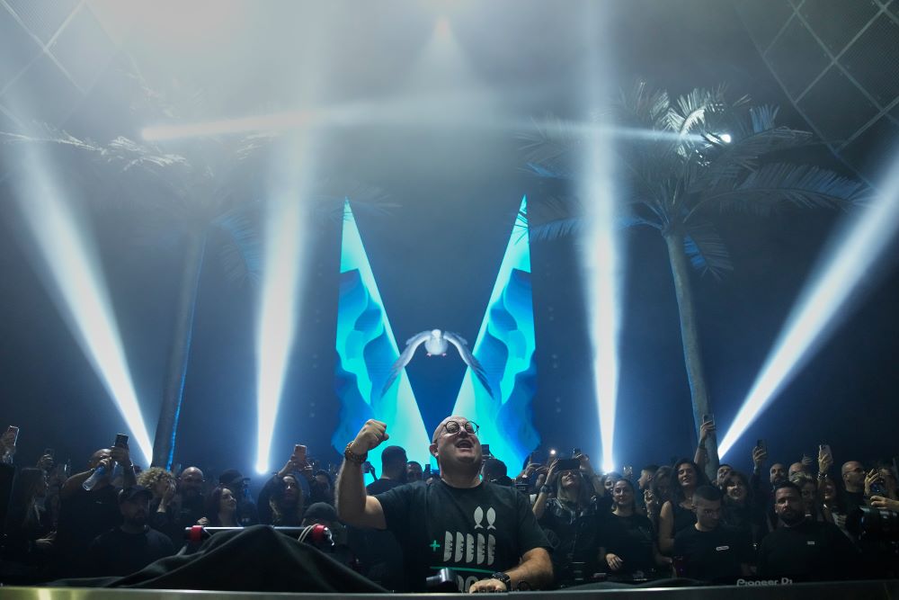 Portuguese Fr. Guilherme Peixoto, a DJ, performs during a concert in Beirut, Lebanon, Jan. 11 after a Lebanese court rejected a request by a group of Christian religious figures who filed a petition seeking a ban to the concert saying it violates the church's teachings. (AP/Hussein Malla)