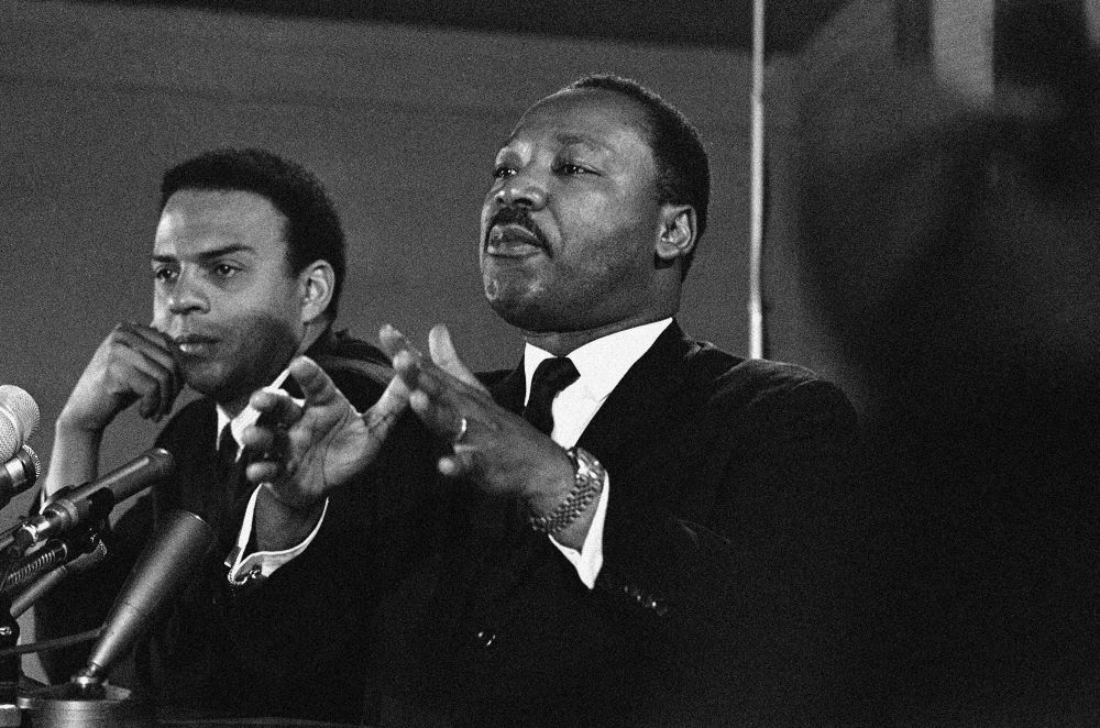 The Rev. Andrew Young, executive vice president of the Southern Conference (left), appears with Martin Luther King Jr., president of the Southern Christian Leadership Conference, on Feb. 7, 1968. (AP)