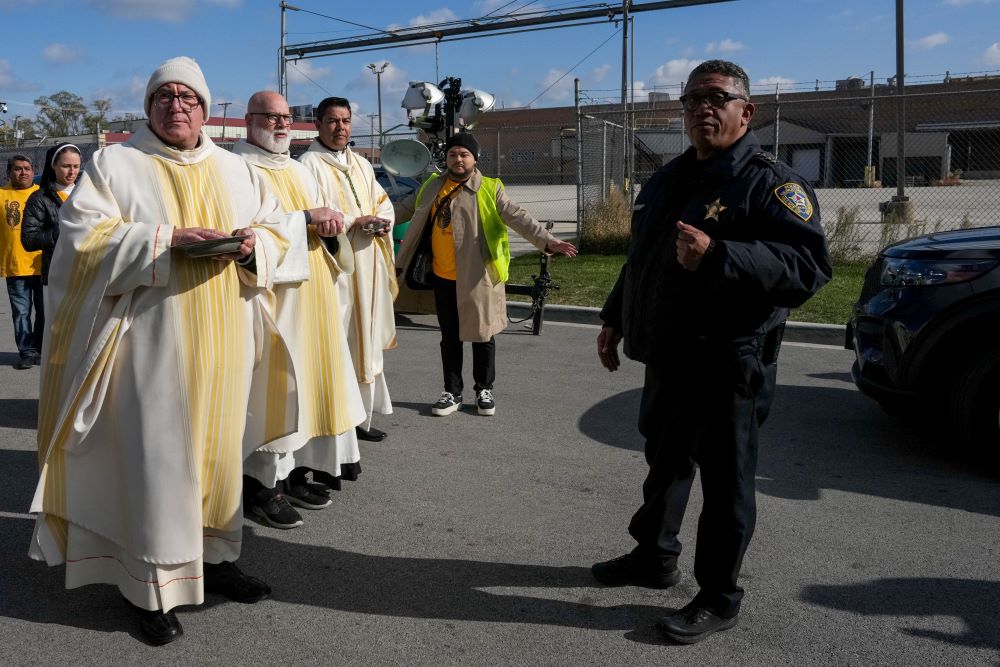 Law enforcement officers prevent clergymen from entering the Broadview ICE facility and offering Communion to immigrants detained inside, during an outdoor Mass in the Broadview section of Chicago Nov. 1, 2025. (OSV News/Reuters/Leah Millis)