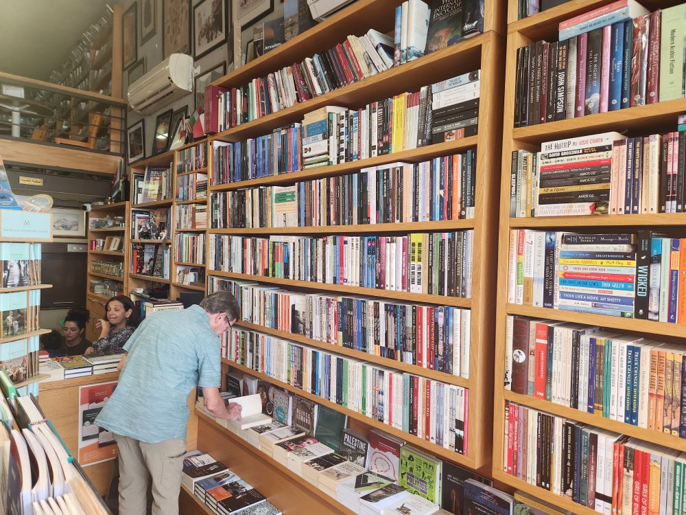 Both in atmosphere and in the titles it carries, many of them scholarly, the Educational Bookshop in east Jerusalem, a family-run business, resembles an academic bookstore that might be found near any large university campus in the United States. (NCR photo/Chris Herlinger)