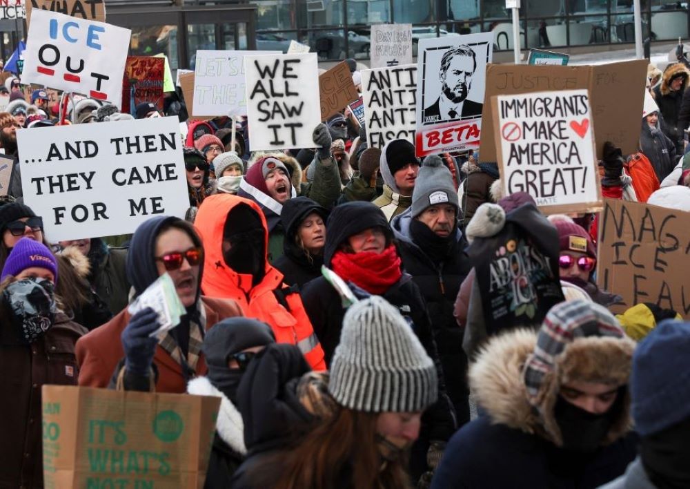 People take part in a demonstration in Minneapolis Jan. 25, a day federal agents shot and killed Alex Pretti, a 37-year-old intensive care unit nurse who was filming at a protest against the immigration crackdown in Minneapolis. (OSV News/Reuters/Shannon Stapleton)