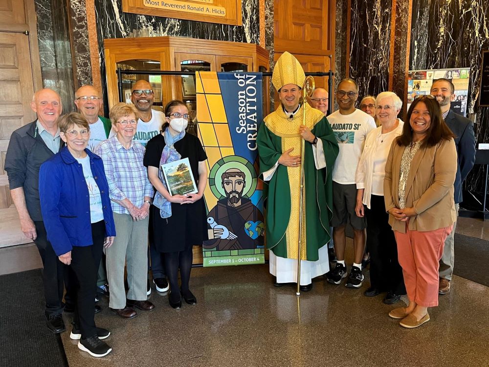 Joliet Bishop Ronald Hicks meets with members of the diocese's Laudato Si' Committee after Mass at the Cathedral of St. Raymond Nonnatus, in Joliet, Illinois. The Mass kicked off the diocese's enrollment in the Laudato Si' Action Platform, the Vatican initiative for Catholic institutions to live out teachings of Pope Francis' 2015 encyclical "Laudato Si'." (Julian Brown)