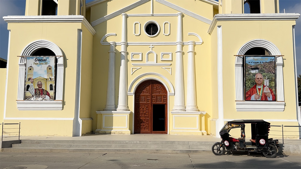 Banners of Pope Leo XIV, the former bishop of Chiclayo, Peru, hang outside the rebuilt Church of Santo Domingo in Olmos, outside of Chiclayo, Aug. 9, 2025. (NCR photo/Justin McLellan)