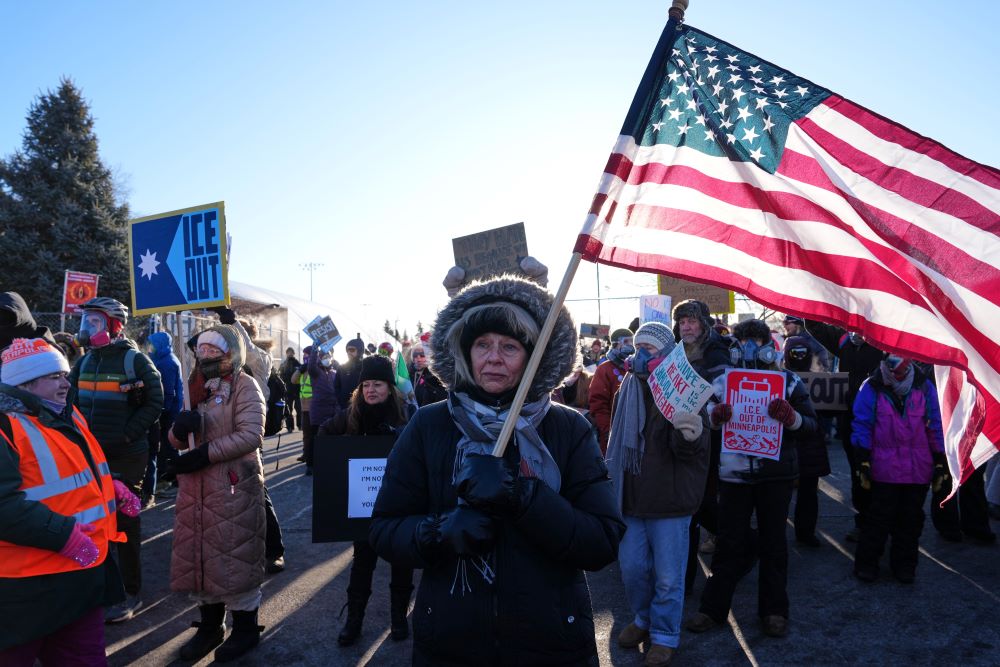 People gather for a protest against ICE outside the Bishop Henry Whipple Federal Building Jan. 30 in Minneapolis. (AP/Adam Gray)