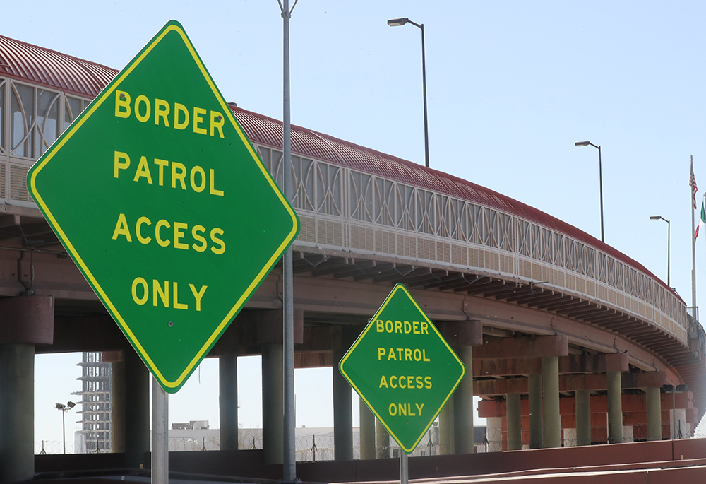 Signs are seen near the port of entry bridge in El Paso, Texas, to cross into Ciudad Juarez, Mexico, March 24, 2025, the day of a protest and vigil led by El Paso Bishop Mark J. Seitz against mass deportations by the U.S. government. (OSV News/Bob Roller)