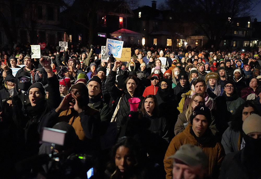 People gather during a vigil for a 37-year-old woman who was shot in her car by a U.S. immigration agent, according to local and federal officials, in Minneapolis Jan. 7, 2026. (OSV News/Tim Evans/Reuters)