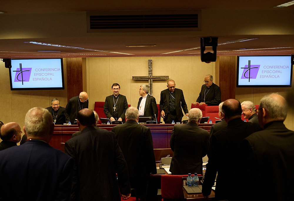 The Spanish bishops conclude their special plenary assembly July 9, 2024. Archbishop Luis Argüello of Valladolid, president of the Spanish bishops' conference, is pictured in the center, with Cardinal José Cobo Cano of Madrid (at left) and Cardinal Juan José Omella of Barcelona (at right). (OSV News/Courtesy of Spanish bishops' conference)