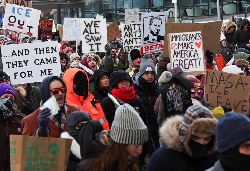 People take part in a demonstration in Minneapolis Jan. 25, 2026, a day after Alex Pretti was fatally shot by a U.S. Border Patrol agent while federal agents were trying to detain him. (OSV News/Reuters/Shannon Stapleton)