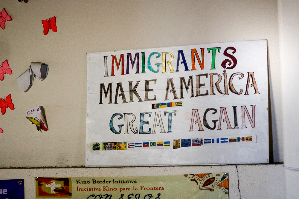 A sign hanging in the Kino Border Initiative reception center in Nogales, Mexico, shares the organization's perspective on what makes America great. (Courtesy of Eileen McKenzie)