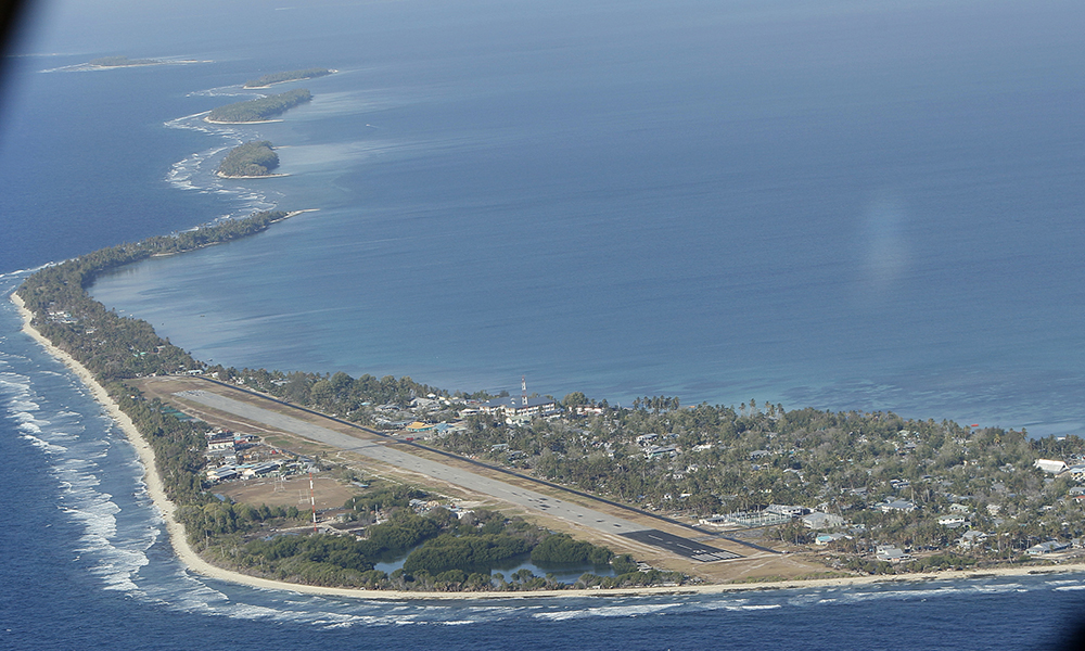 In this Oct. 13, 2011 photo, Funafuti, the main island of the nation state of Tuvalu, is seen from a Royal New Zealand airforce C130 aircraft as it approaches at Funafuti, Tuvalu, South Pacific. (AP/Alastair Grant, file)