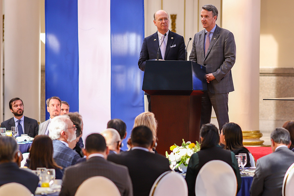 Rep. Tom Suozzi, right, a Democrat from New York, speaks during the National Prayer Breakfast hosted by Salvadoran President Nayib Bukele at the National Palace in San Salvador, El Salvador, Jan. 19, 2026. Standing next to Suozzi is Rep. John Moolenaar, R-Mich. (AP/Salvador Melendez)
