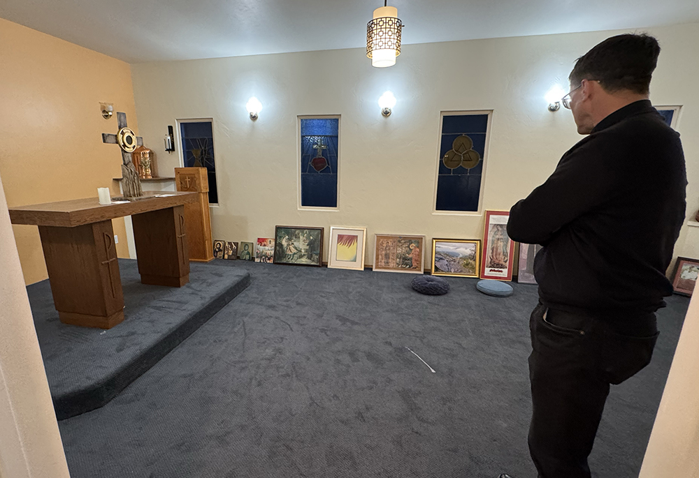 Jesuit Fr. Scott Santarosa, the pastor of Our Lady of Guadalupe Parish in San Diego, looks into the chapel of the Pope Francis Center on the parish grounds. (Anna Weaver)