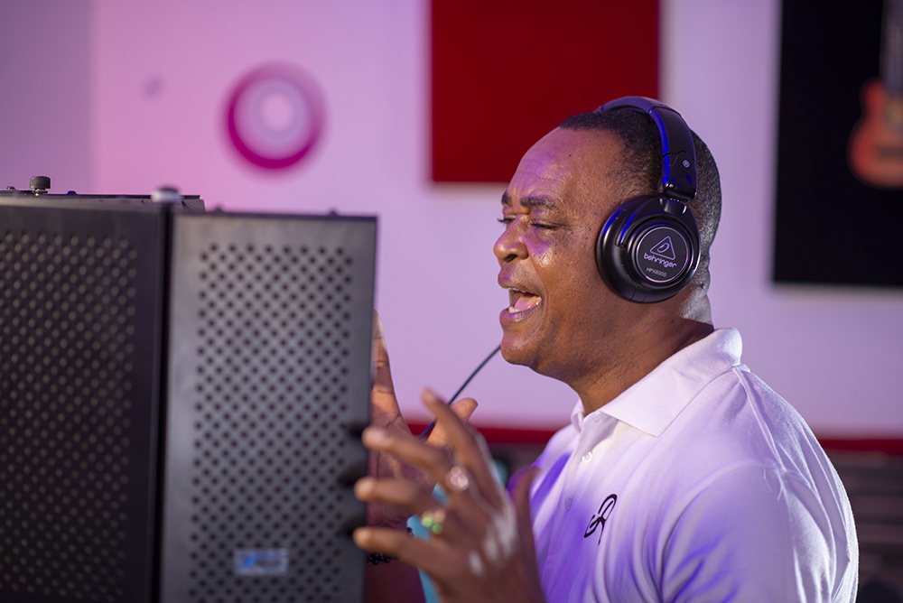 Musician and composer Jude Nnam records his song "Ndi Nna" in a studio in this undated photo. (Courtesy of Jude Nnam)