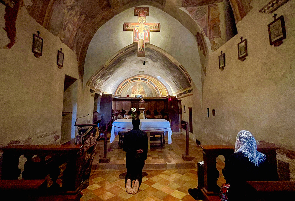 The interior of the Church of San Damiano outside of Assisi, Italy. Above the altar today is a replica of the crucifix from which Christ spoke to St. Francis of Assisi, saying: "Francis, go and repair my house, which, as you see, is falling completely to ruin." (Dreamstime/Debra Reschoff Ahearn)
