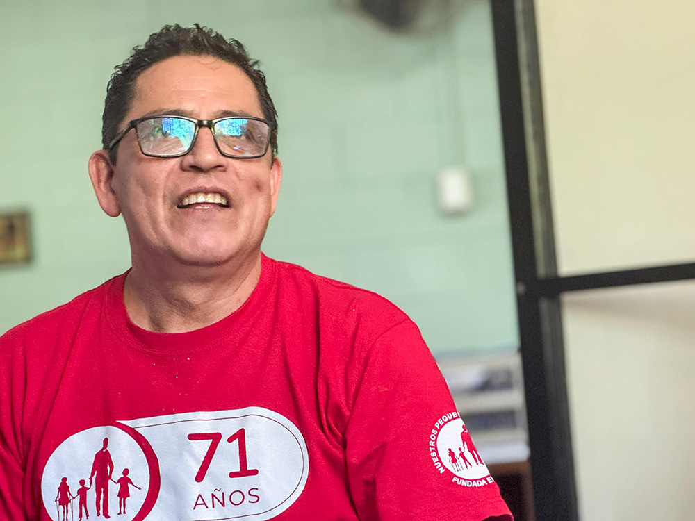 José Juan Lizarde speaks warmly Jan. 19, 2025, in El Salvador about meeting Ronald Hicks in Mexico before he became a priest. Lizarde considers Hicks a brother, a great friend who has remained close to his family even as his responsibilities as a bishop have increased. (NCR photo/Rhina Guidos)