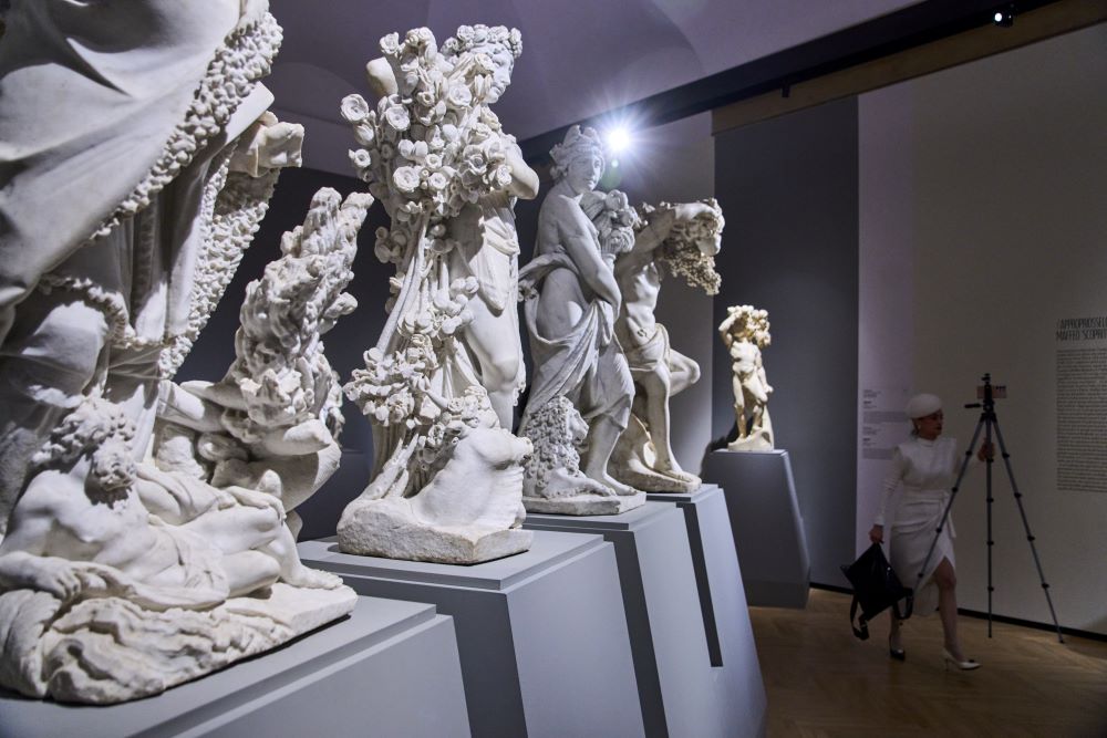 Journalists attend the press preview of the exhibition "Bernini and the Barberini" at Palazzo Barberini in Rome on Feb. 11. The marble statues from The Four Seasons cycle by Pietro Bernini and his son Gian Lorenzo Bernini are on display. (AP/Domenico Stinellis)