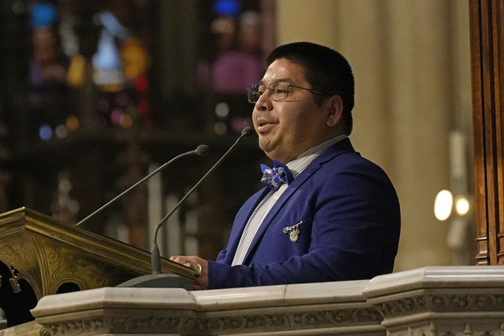 Samuel Jiménez proclaims the first reading in Spanish during the installation Mass of Archbishop Ronald Hicks as the new archbishop of New York at St. Patrick's Cathedral in New York City Feb. 6. (OSV News/Gregory A. Shemitz)