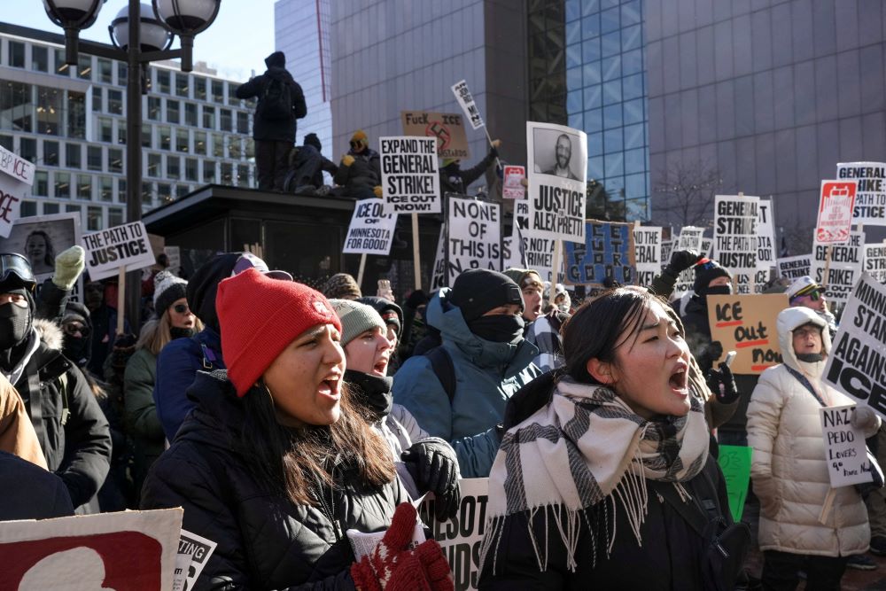 Demonstrators attend an "ICE Out" protest in Minneapolis Jan. 30, after the fatal shootings of Renee Nicole Good and Alex Pretti by U.S. federal immigration agents. Protesters held "no work, no school, no shopping" strikes across the U.S. that day to oppose the Trump administration's immigration crackdown. (OSV News/Reuters/Tim Evans)