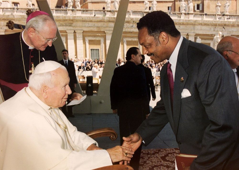 Pope John Paul II greets the Rev. Jesse Jackson at the end of the pope's weekly audience at the Vatican June 23, 1999. Jackson, a towering civil rights icon, died at age 84 Feb. 17. (OSV News photo/Vatican)